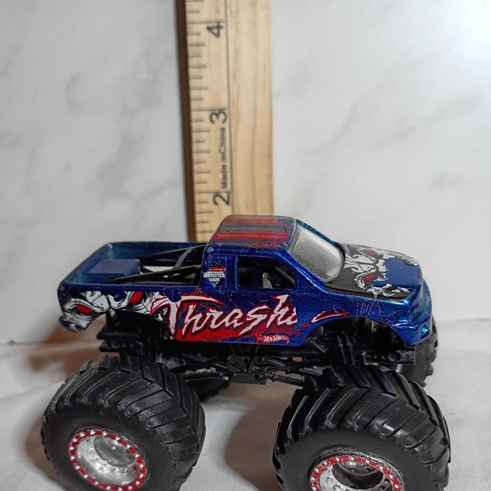 Hot Wheels Monster Jam Thrasher Blue Diecast Monster Truck 1:64 Scale